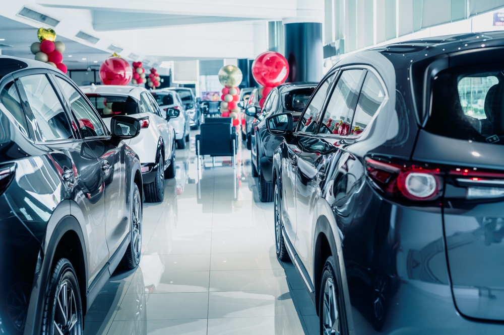 Auto dealership vehicle lot and service area monitored by covered security cameras after hours